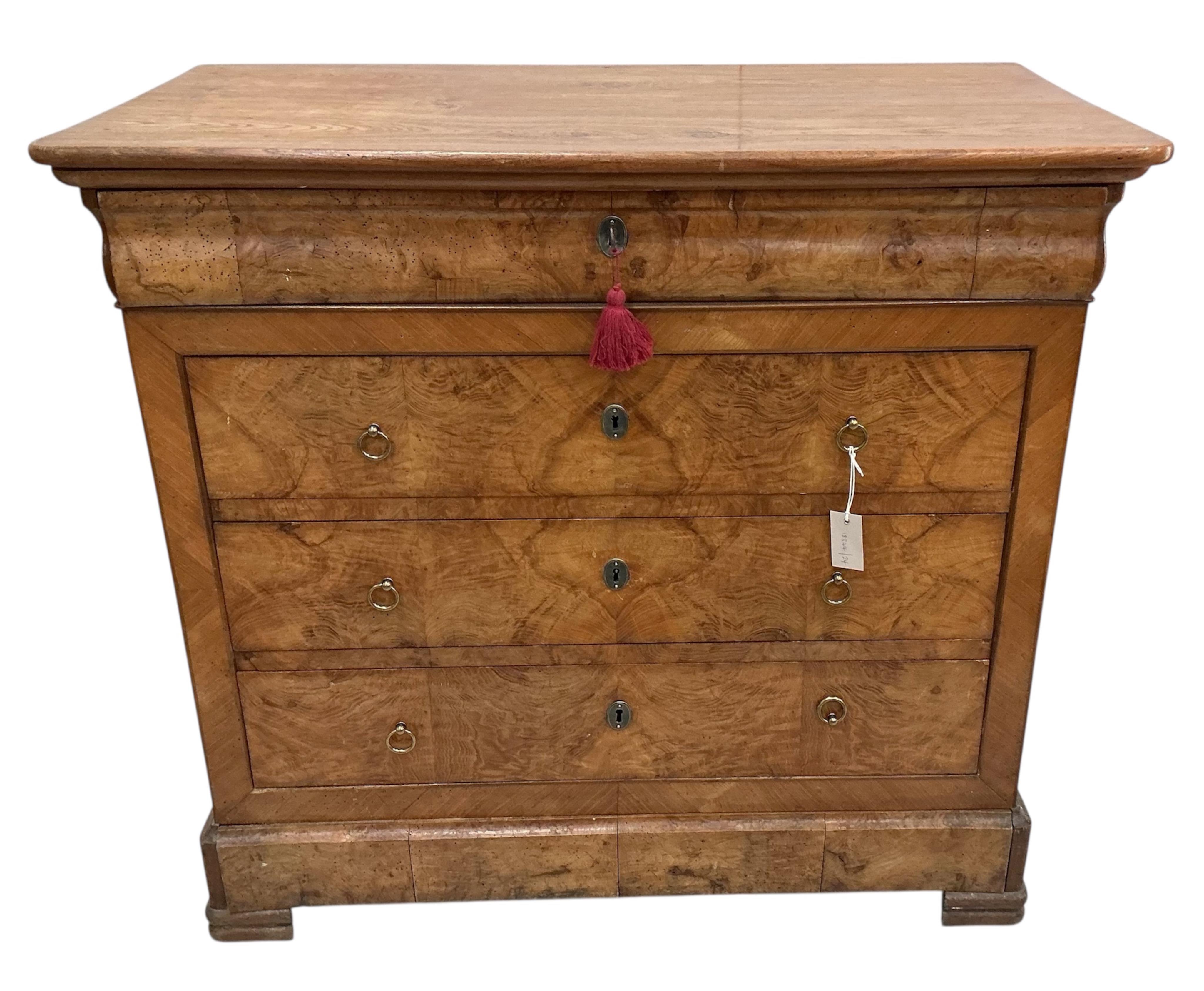 A 19th century French elm commode, width 104cm, depth 56cm, height 96cm